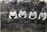 "Four Women Reading While Sitting in the Grass" Thumbnail