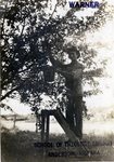 "Man Picking Fruit from a Tree" miniatura